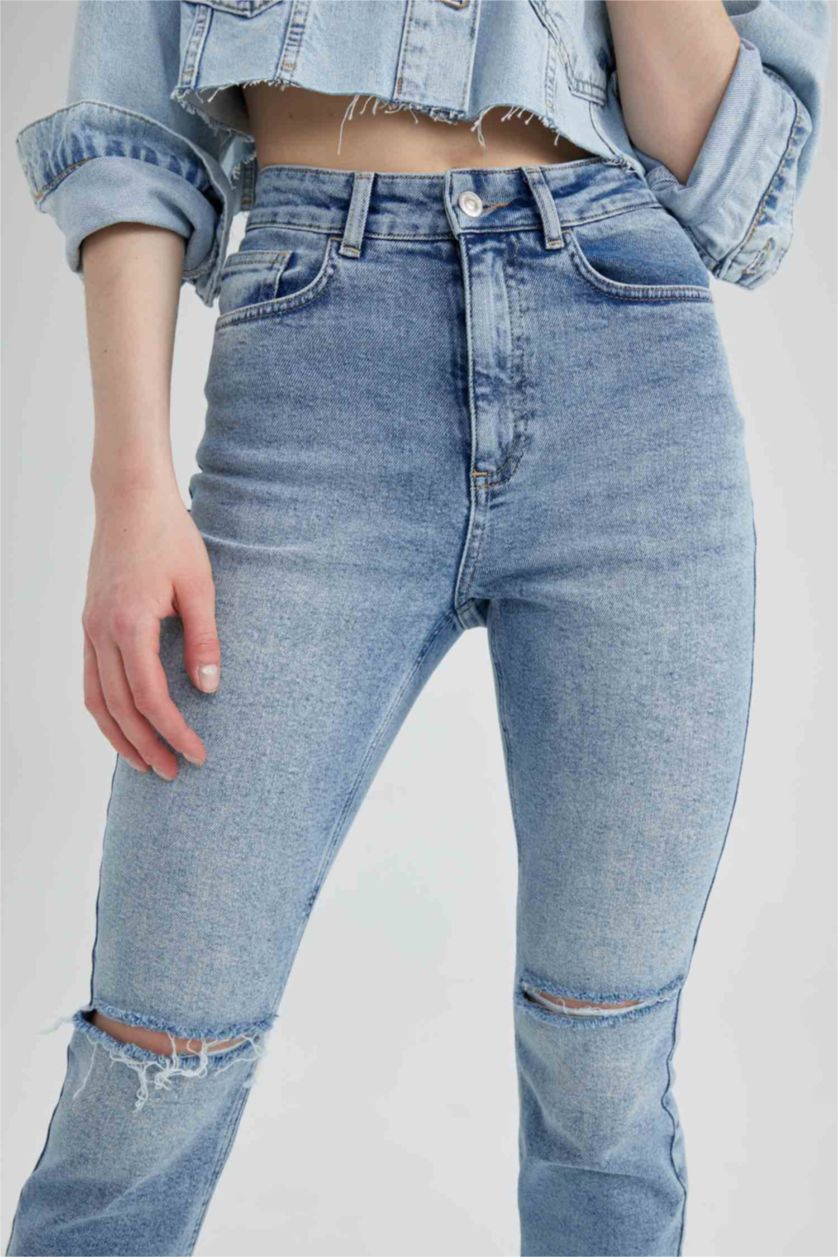 حريمي أزرق فاتح بنطلون جينز ممزق