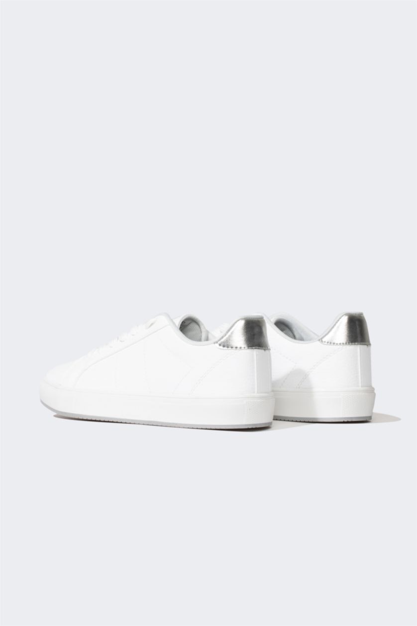 حريمي أبيض (000) حذاء رياضي حريمي جلد صناعي برباط