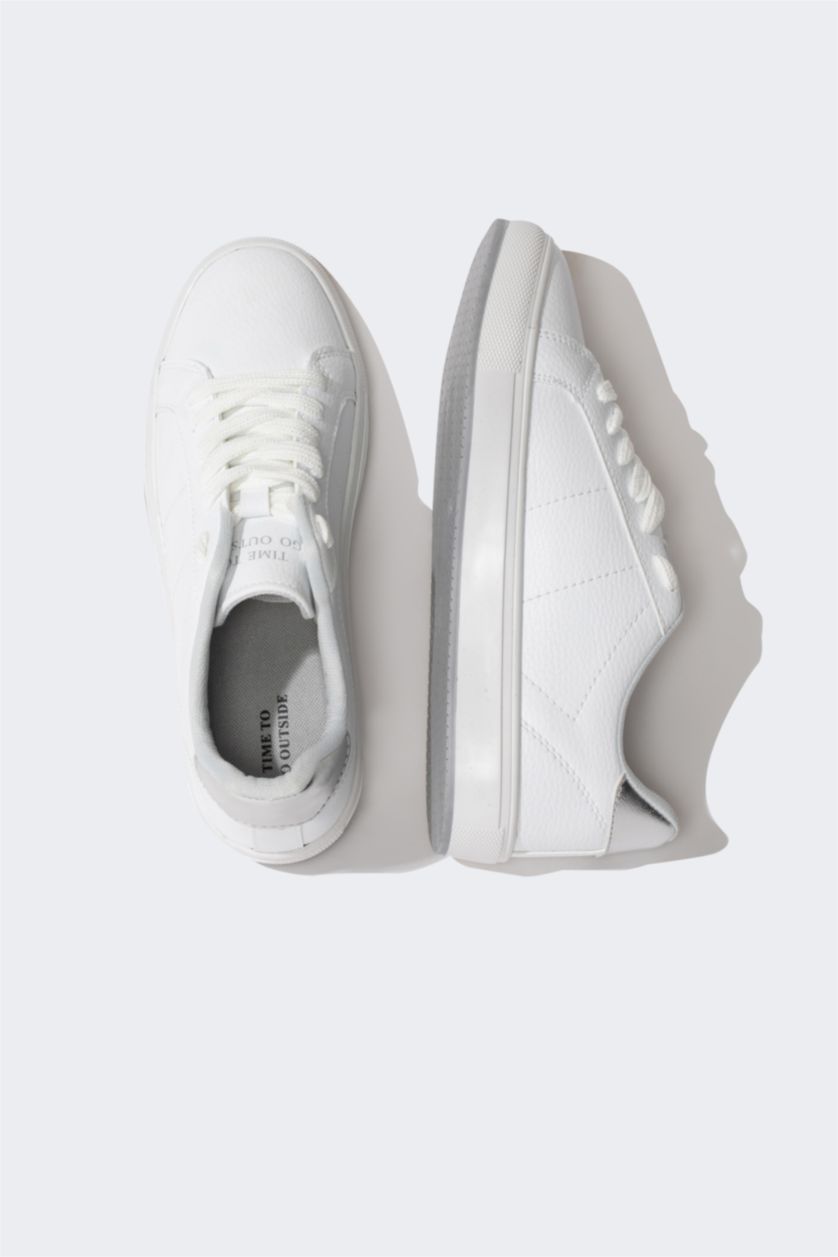 حريمي أبيض (000) حذاء رياضي حريمي جلد صناعي برباط