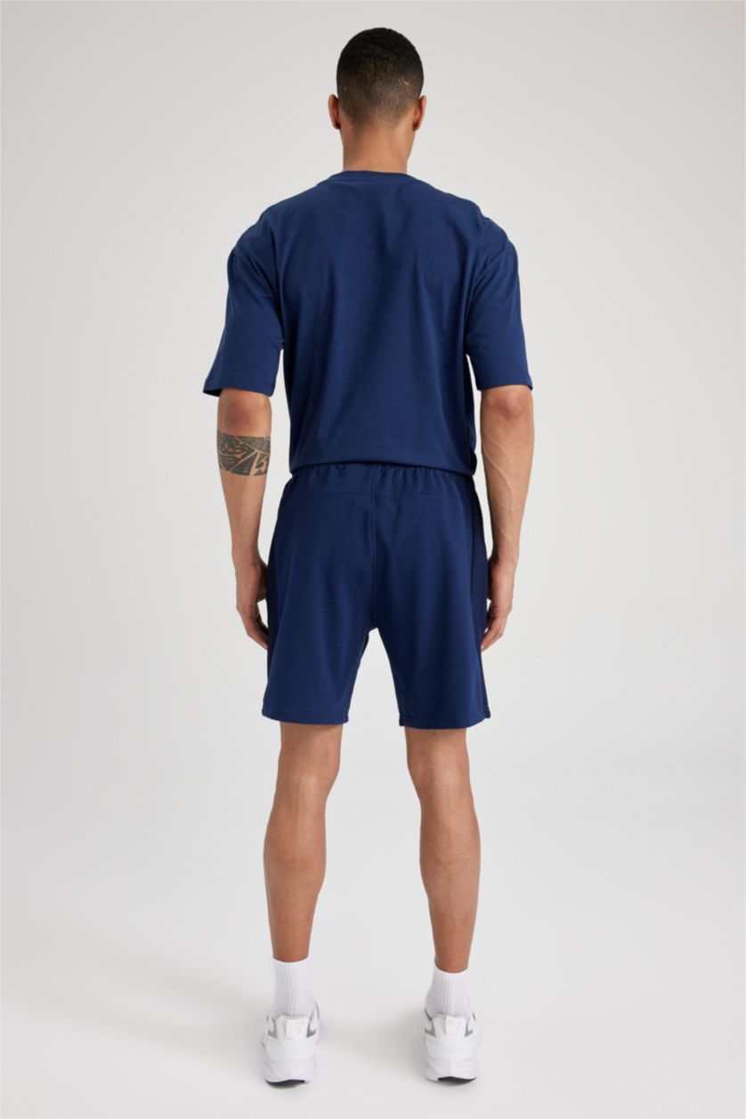 رجالي كحلي شورت سليم فيت بجيب