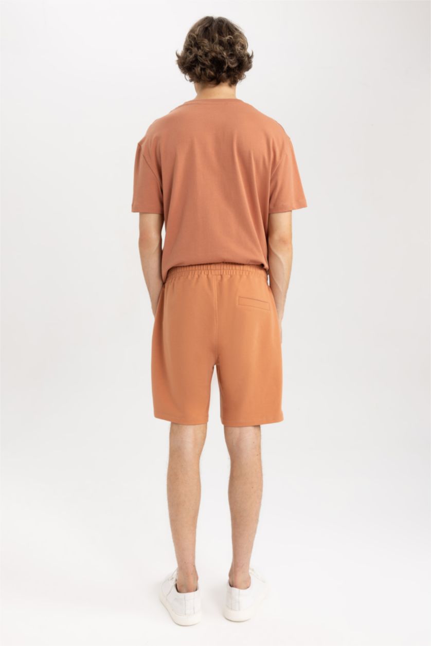 رجال برتقالي شورت سليم فيت بجيب