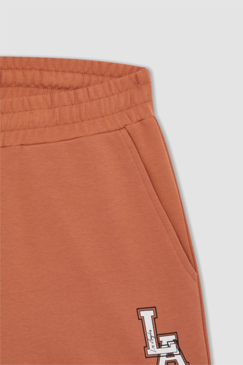 رجال برتقالي شورت سليم فيت بجيب