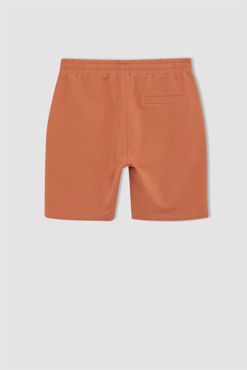 رجال برتقالي شورت سليم فيت بجيب