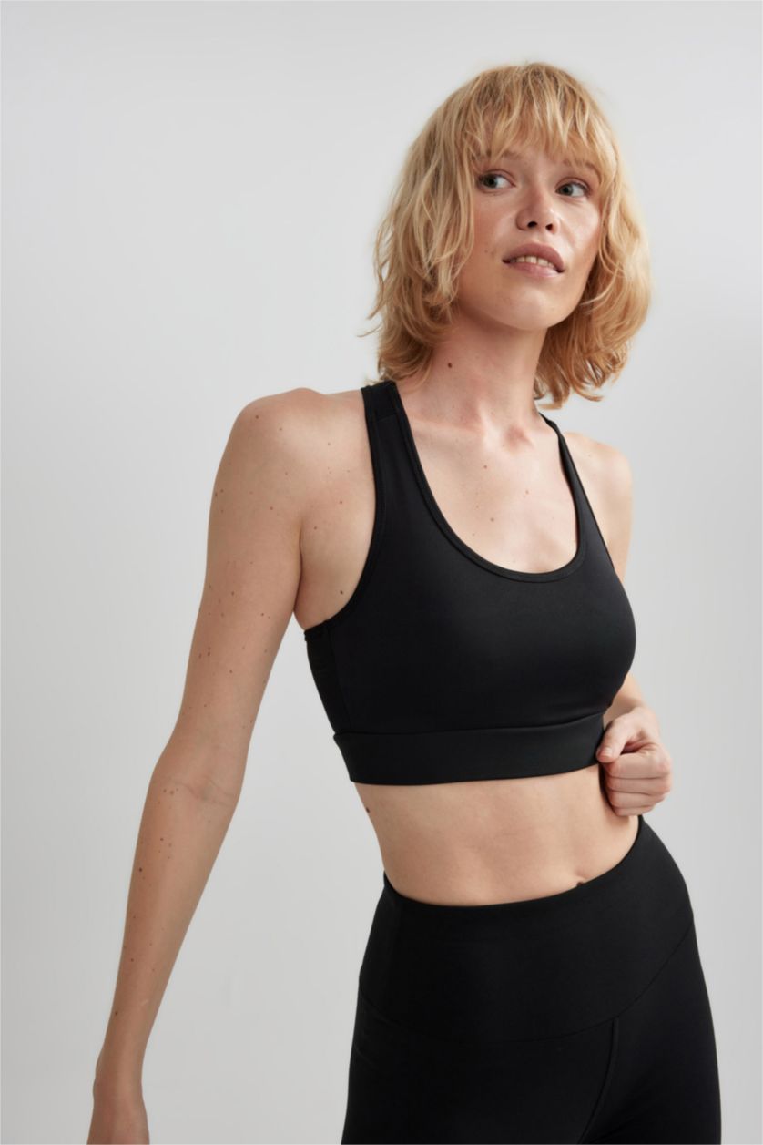 حريمي أسود برا بطبعة شعار برقبة مستديرة