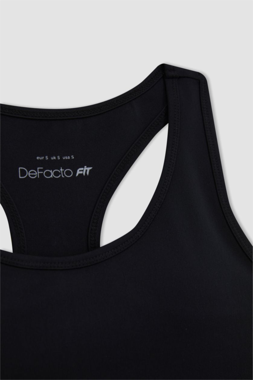 حريمي أسود برا بطبعة شعار برقبة مستديرة