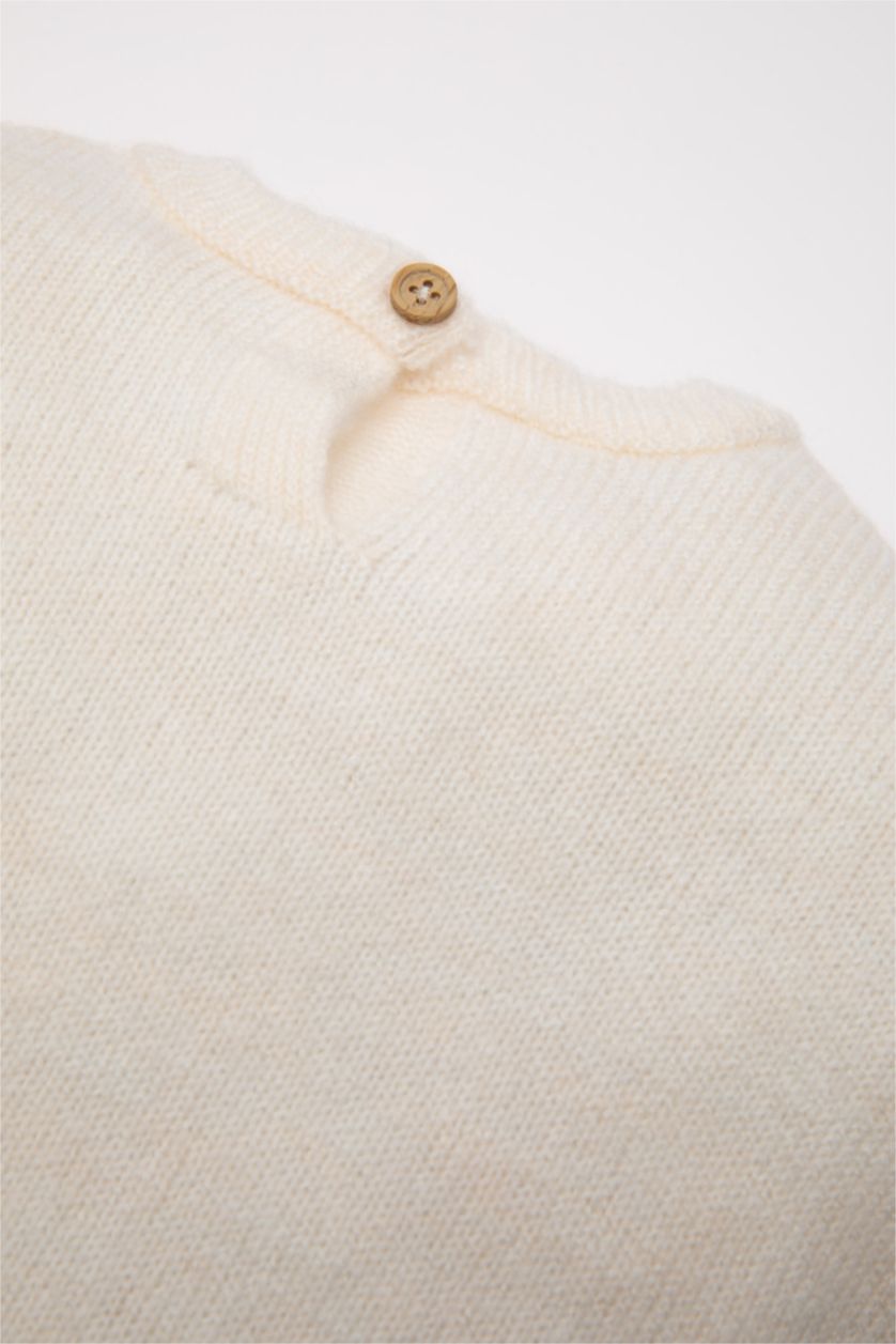 طفلة صغيرة بيج فاتح بلوفر تريكو بناتي قصة عادية برقبة مستديرة