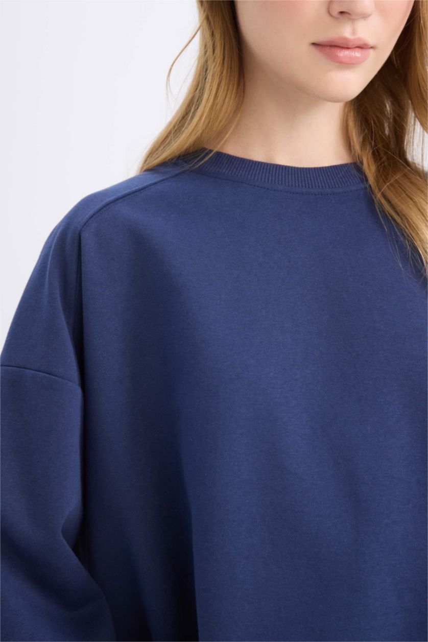 نساء كحلي سويت شيرت واسع برقبة مستديرة