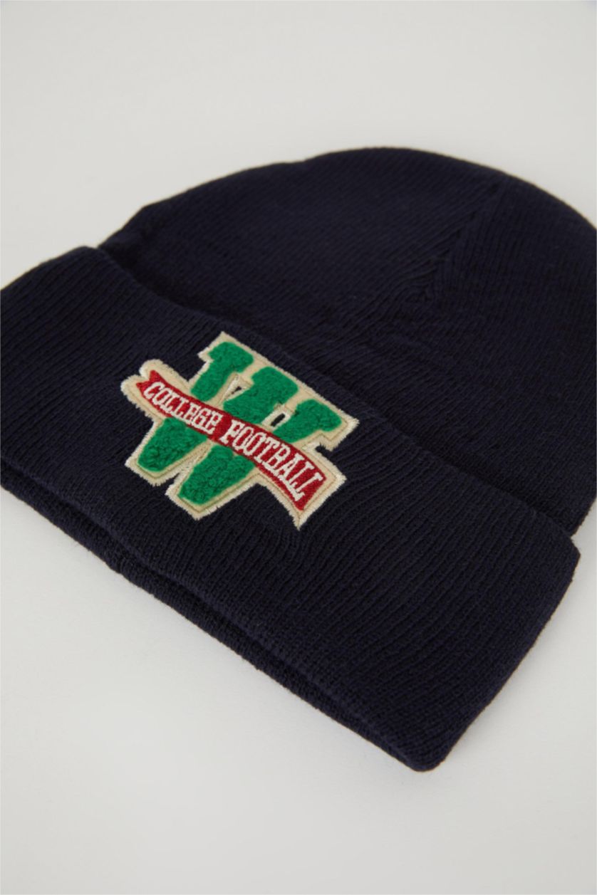 أولادي أزرق غامق ايس تريكو كاب اولادي بأتيكت