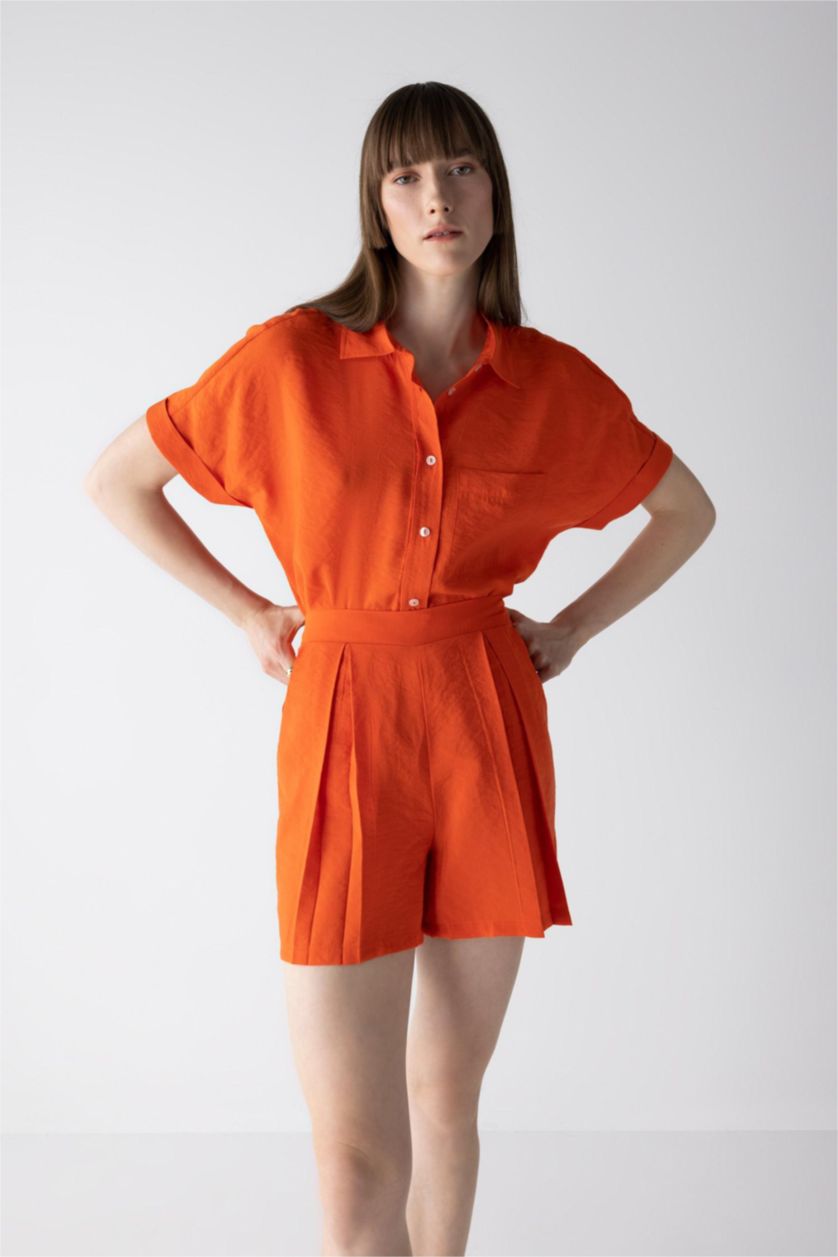 FEMME Orange Short Taille haute Ourlet large
