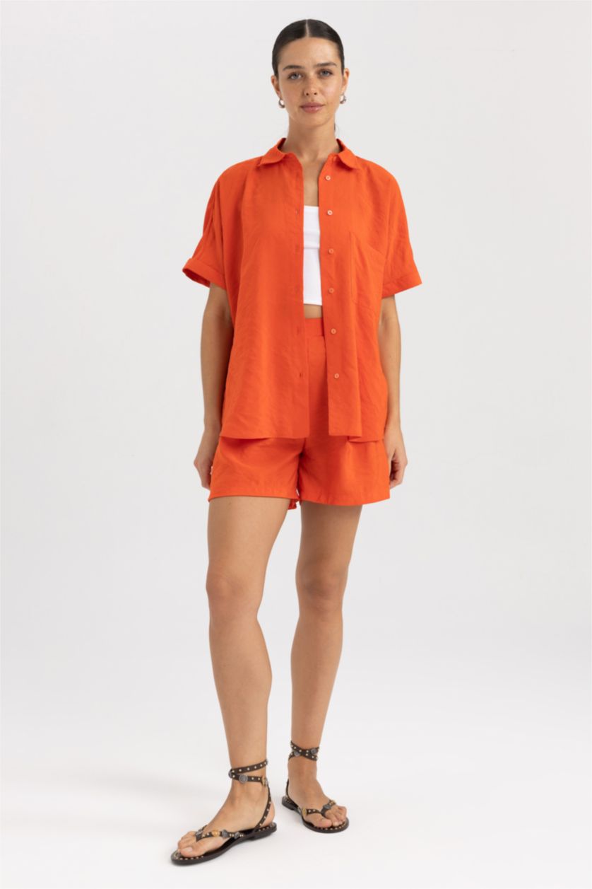 FEMME Orange Short Taille haute Ourlet large