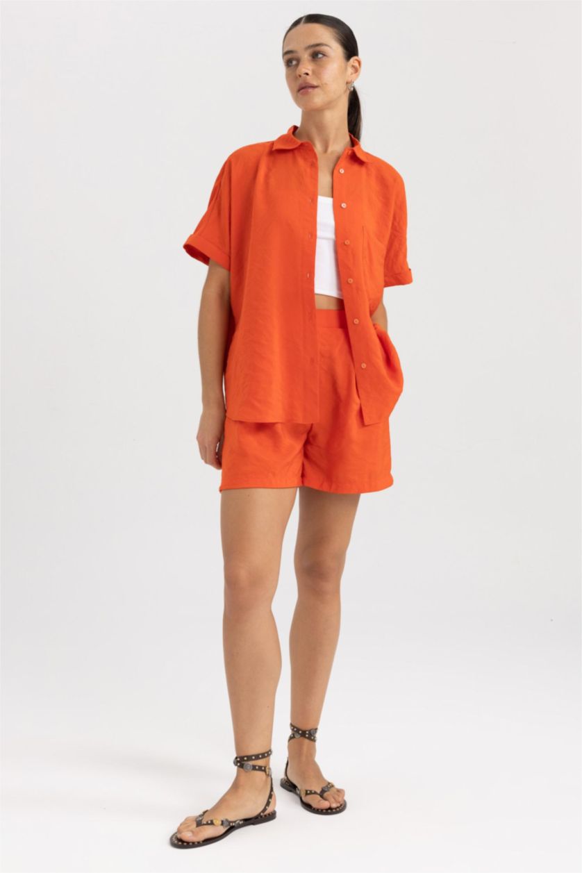 FEMME Orange Short Taille haute Ourlet large