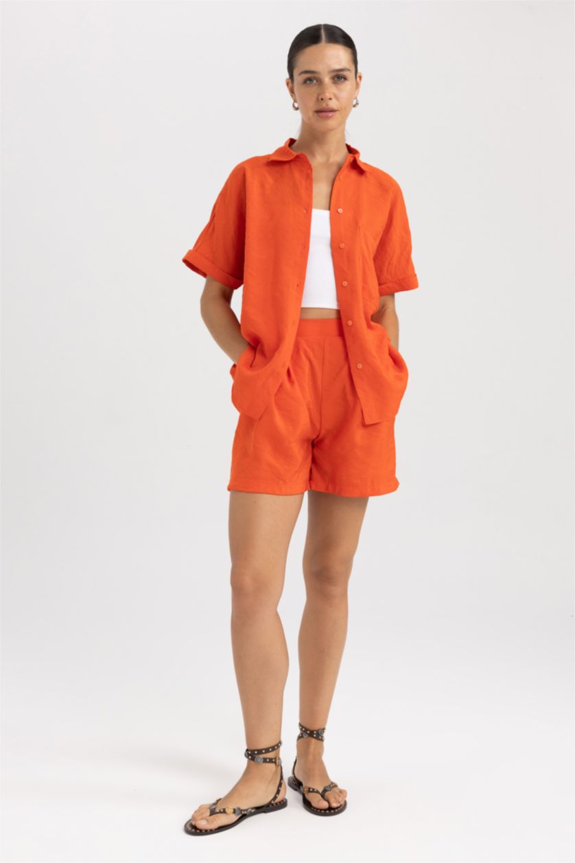 FEMME Orange Short Taille haute Ourlet large