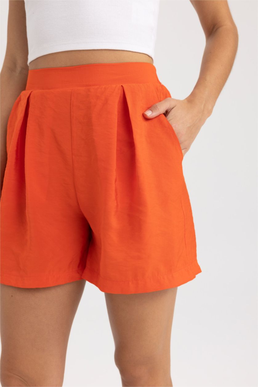 FEMME Orange Short Taille haute Ourlet large