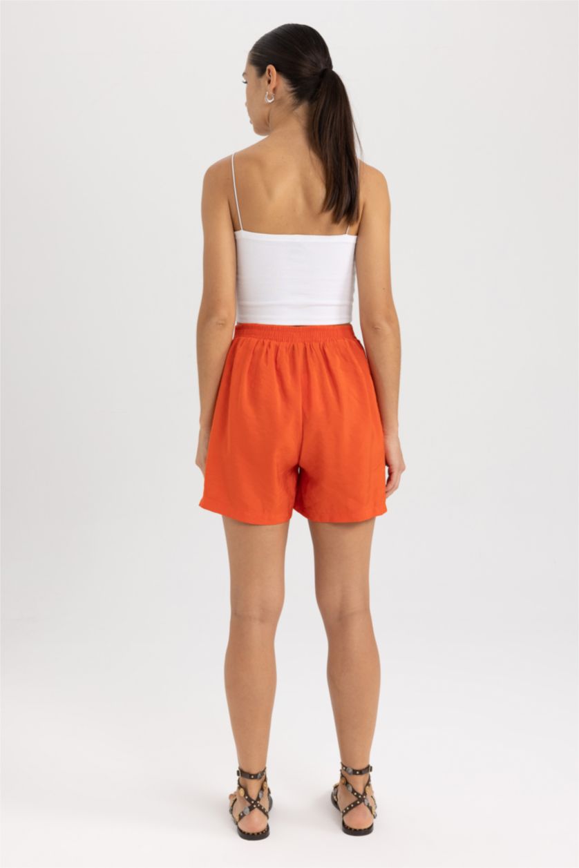 FEMME Orange Short Taille haute Ourlet large