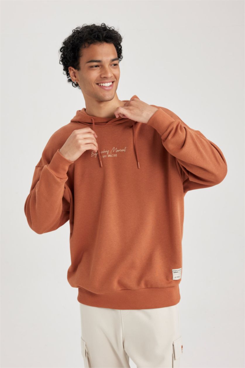 MAN Dark Orange Oversize Fit Printed Long Sleeve Sweatshirt