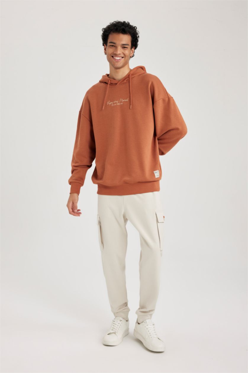 MAN Dark Orange Oversize Fit Printed Long Sleeve Sweatshirt