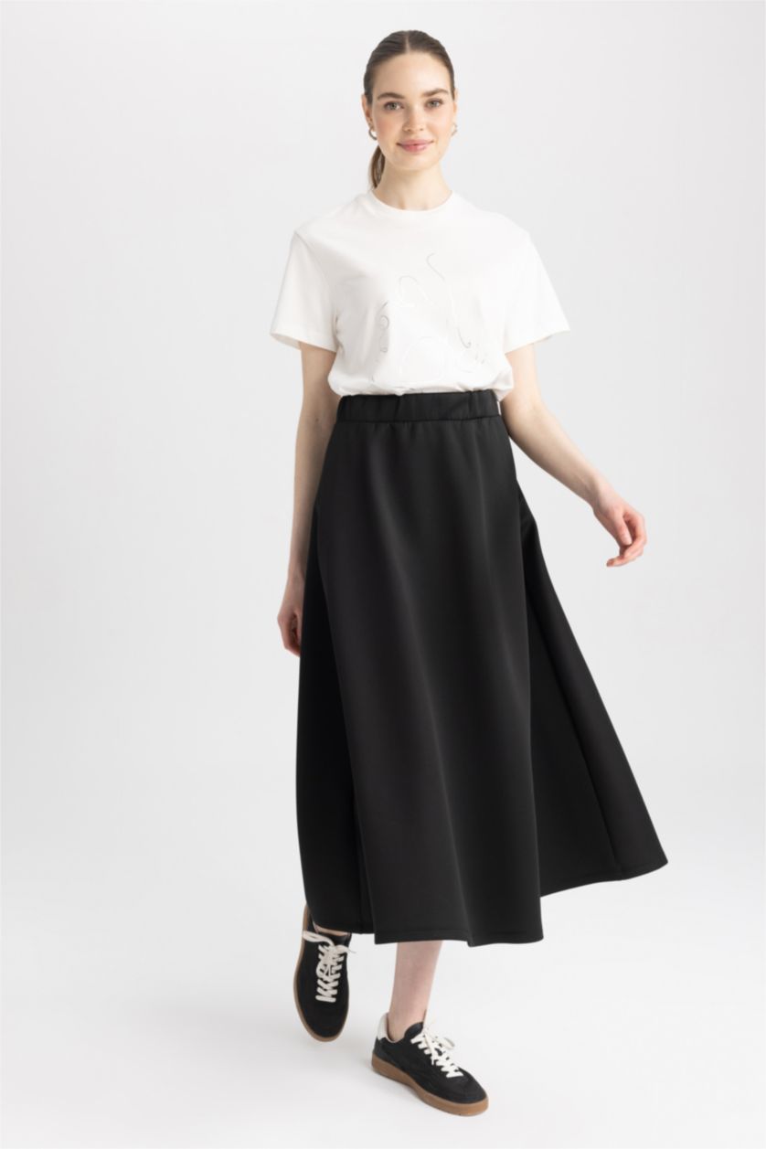 حريمي أسود جيبة من قماش سكوبا قصة A