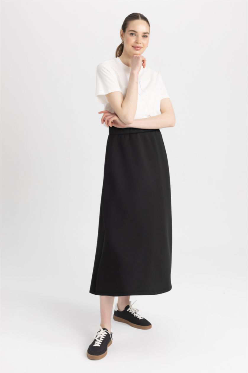 حريمي أسود جيبة من قماش سكوبا قصة A