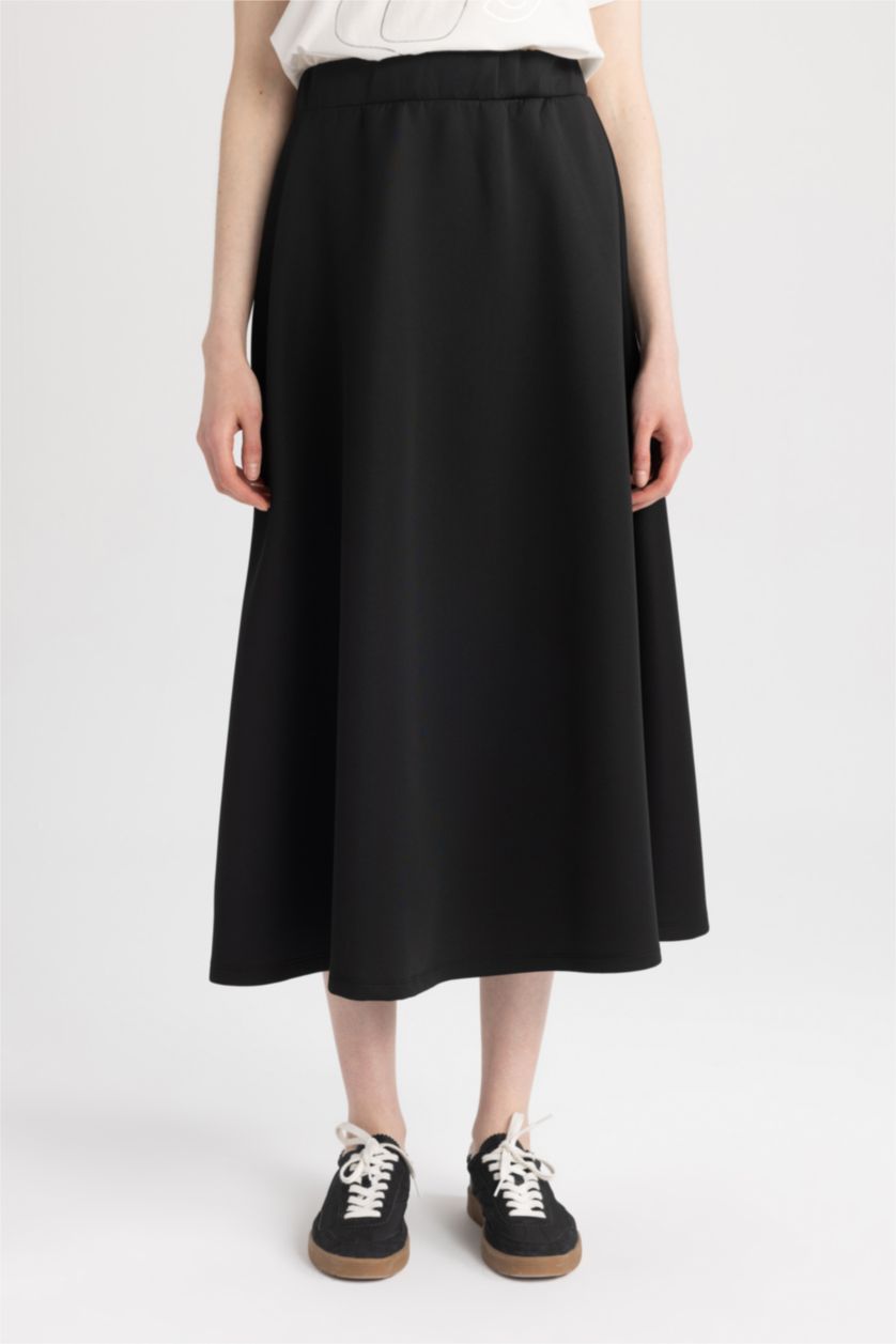 حريمي أسود جيبة من قماش سكوبا قصة A