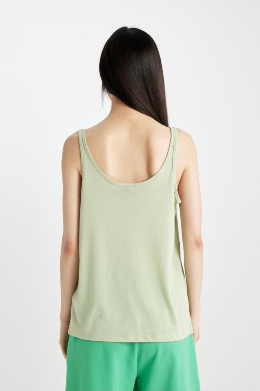 حريمي أخضر فاتح كروب توب قصة عادية برقبة مستديرة