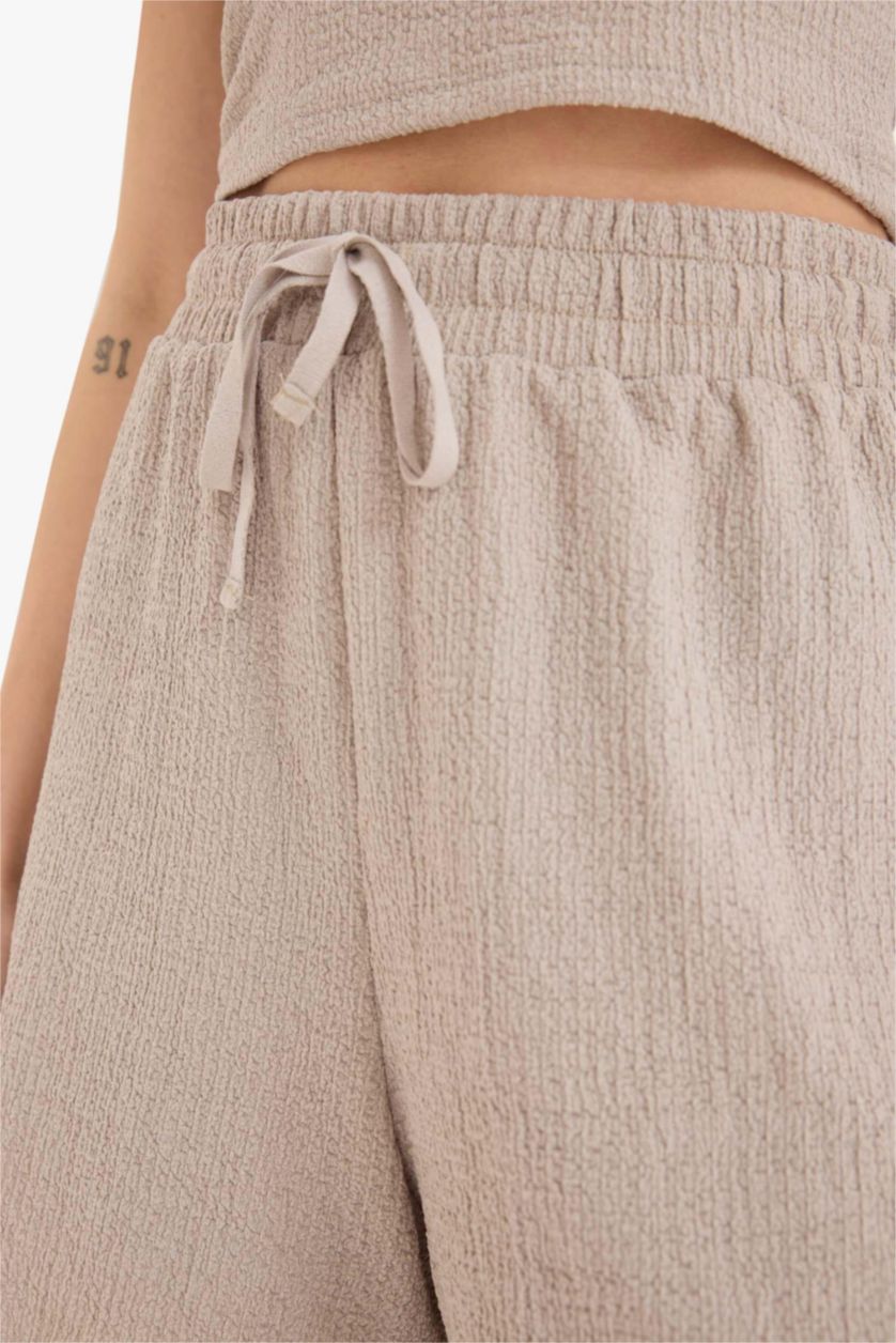 حريمي بيج شورت منسوج قصة فضفاضة