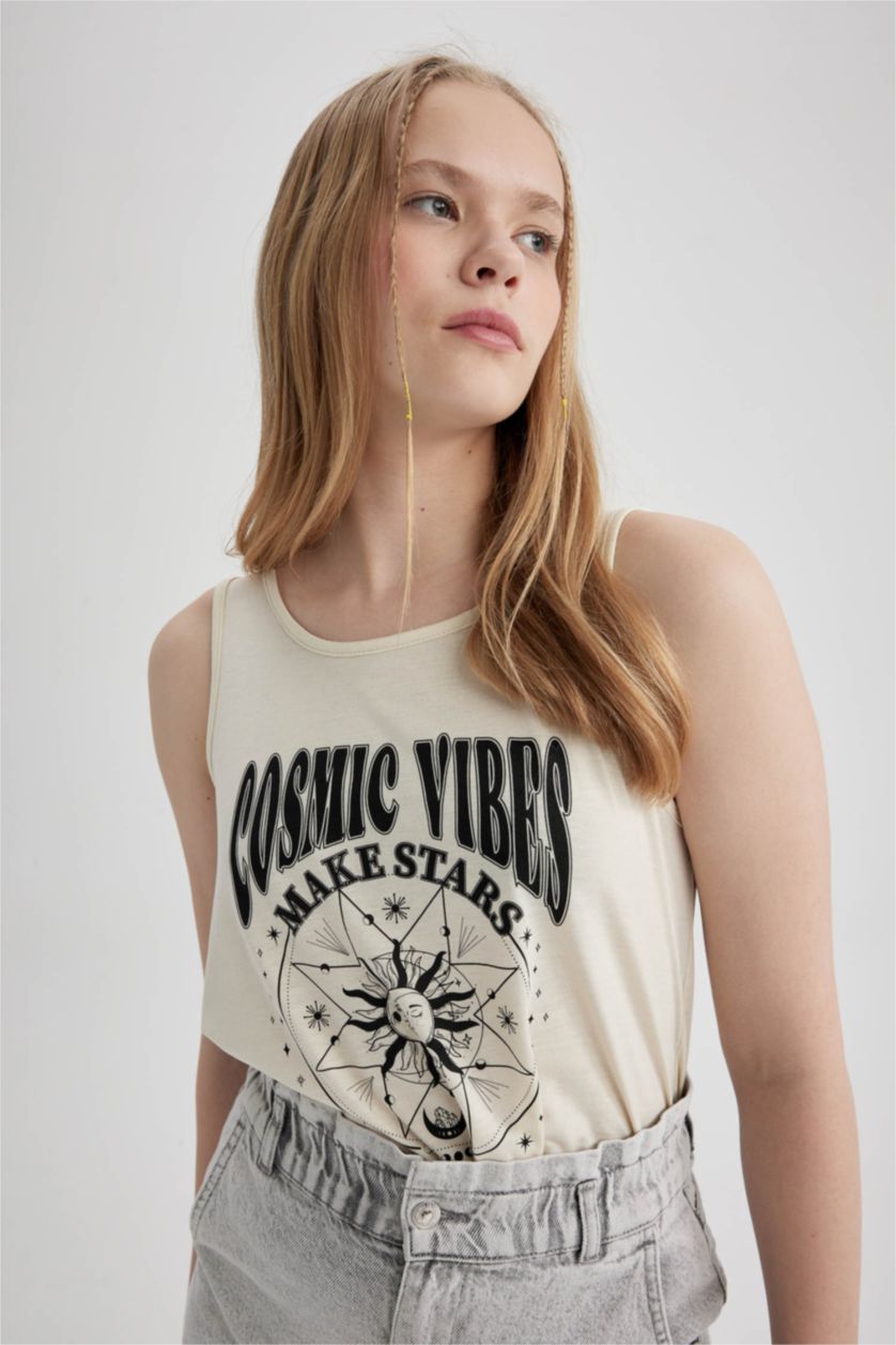 نساء اللون الرملي فانيلة بقصة عادية مطبوع