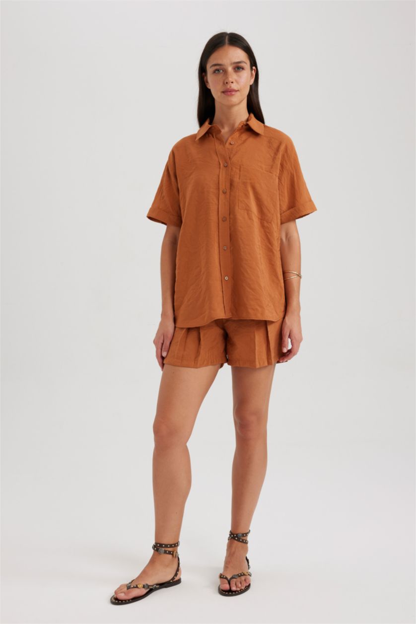 نساء بني فاتح قميص نص كم وقصة عادية