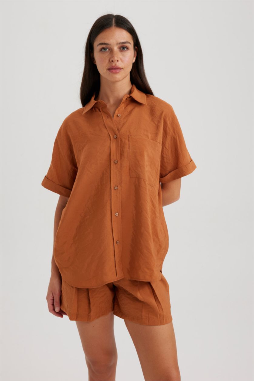 نساء بني فاتح قميص نص كم وقصة عادية