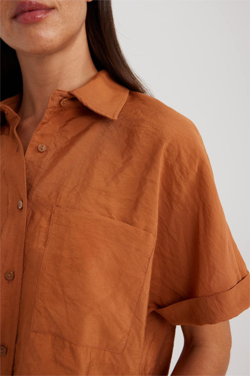 نساء بني فاتح قميص نص كم وقصة عادية