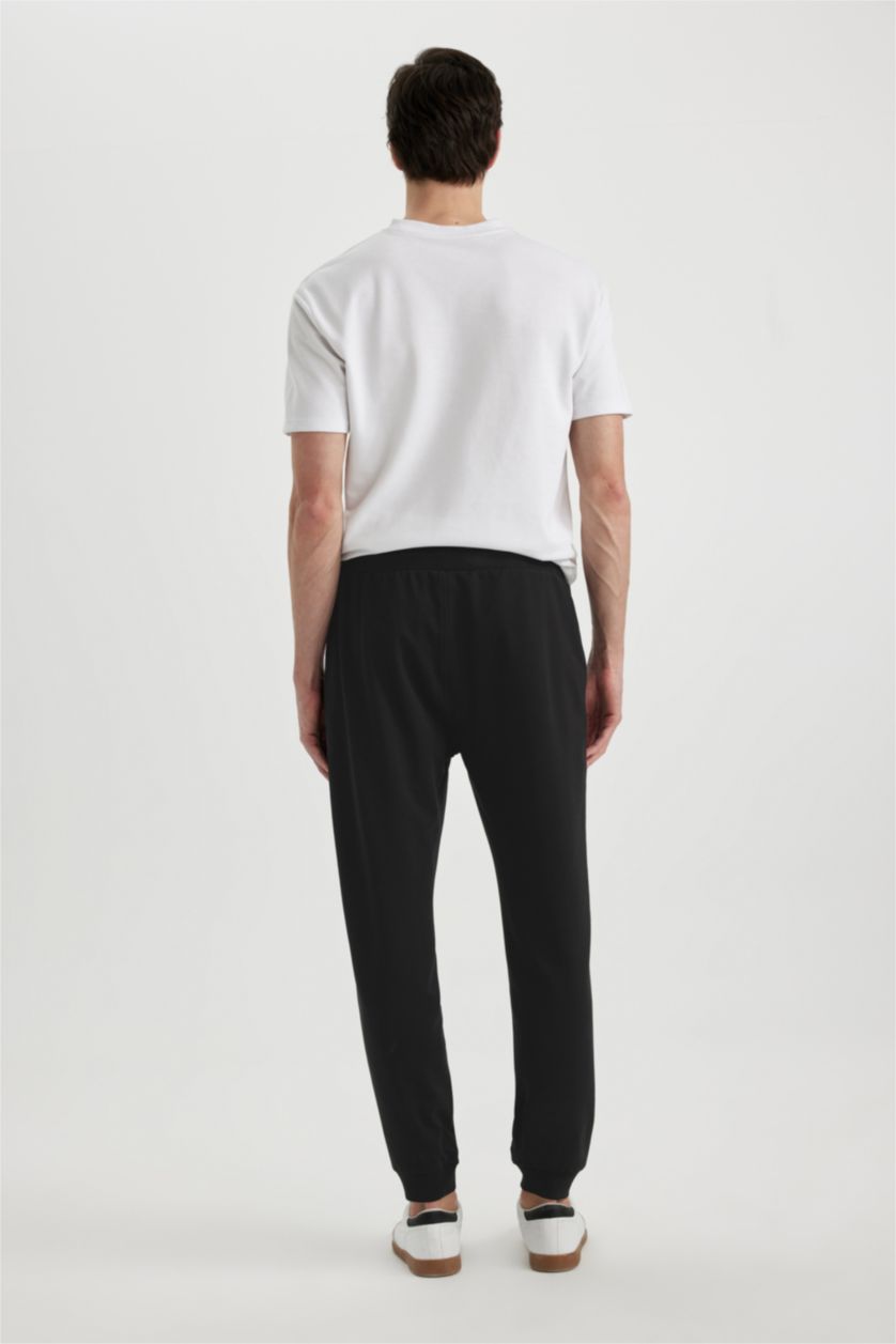 MAN Black Slim Fit Rib Hem Trousers