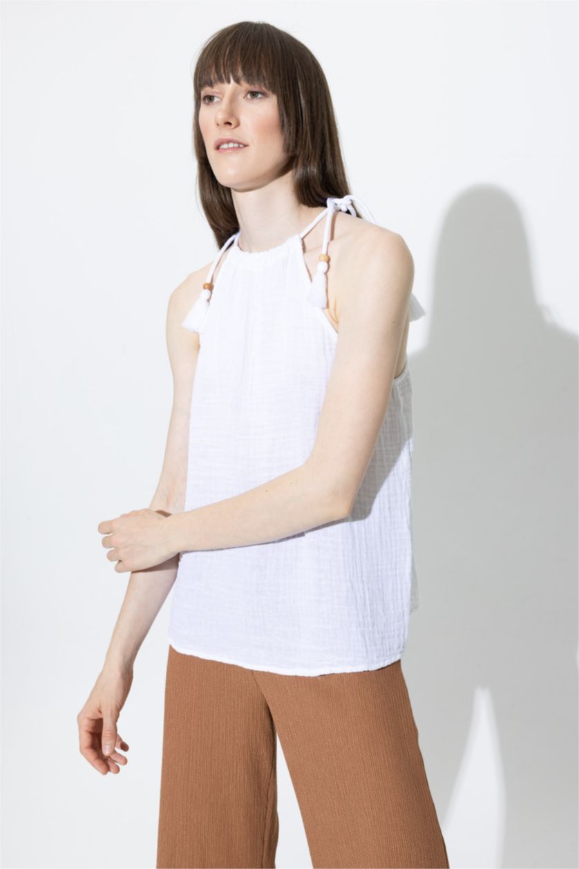 نساء أبيض بلوزة بدون أكمام قصة عادية برقبة رسن