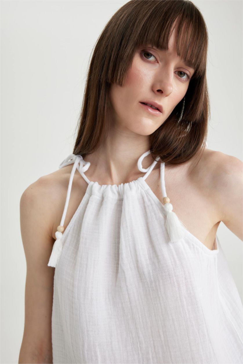 نساء أبيض بلوزة بدون أكمام قصة عادية برقبة رسن