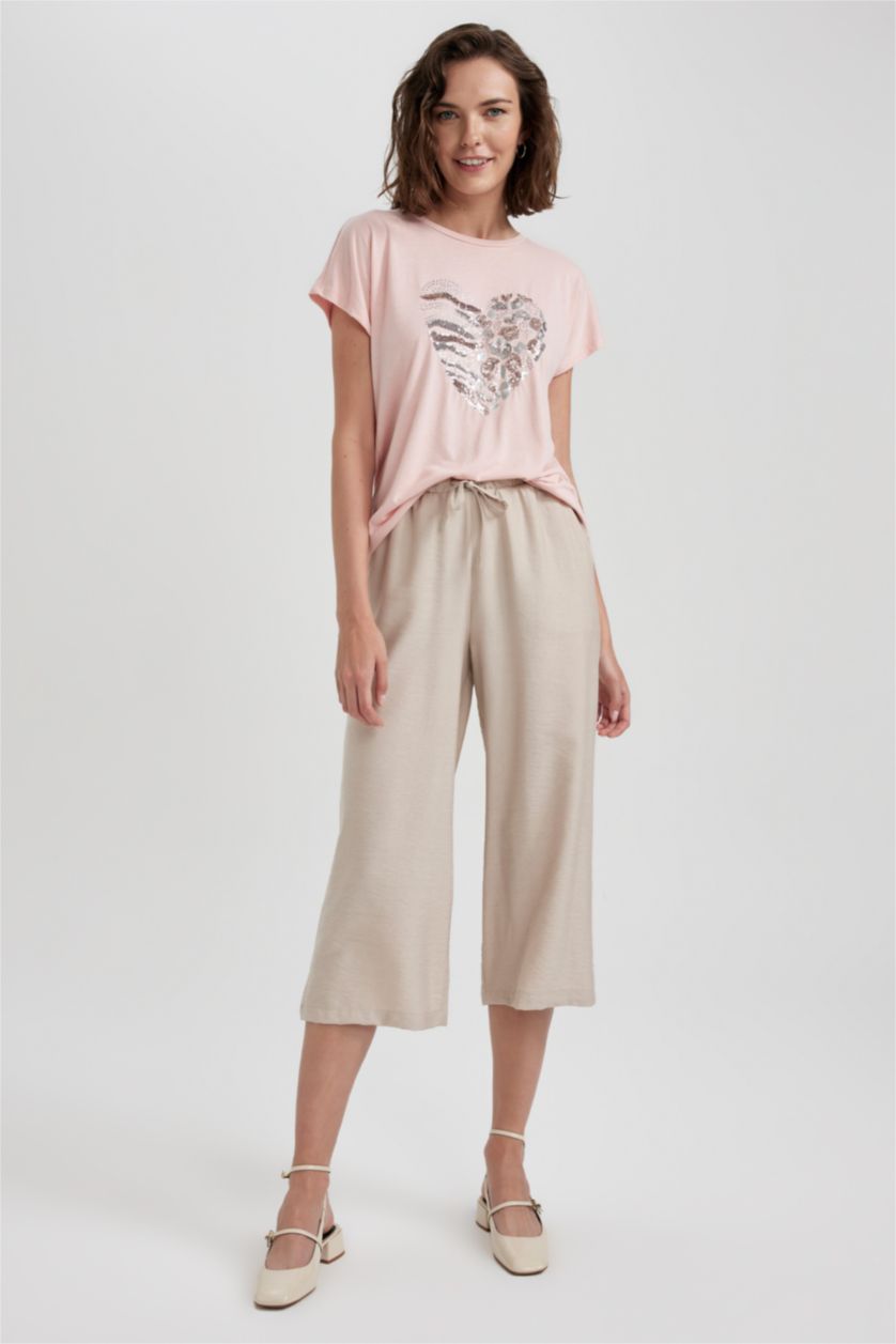 حريمي بيج بنطلون كابري كتان بجيب