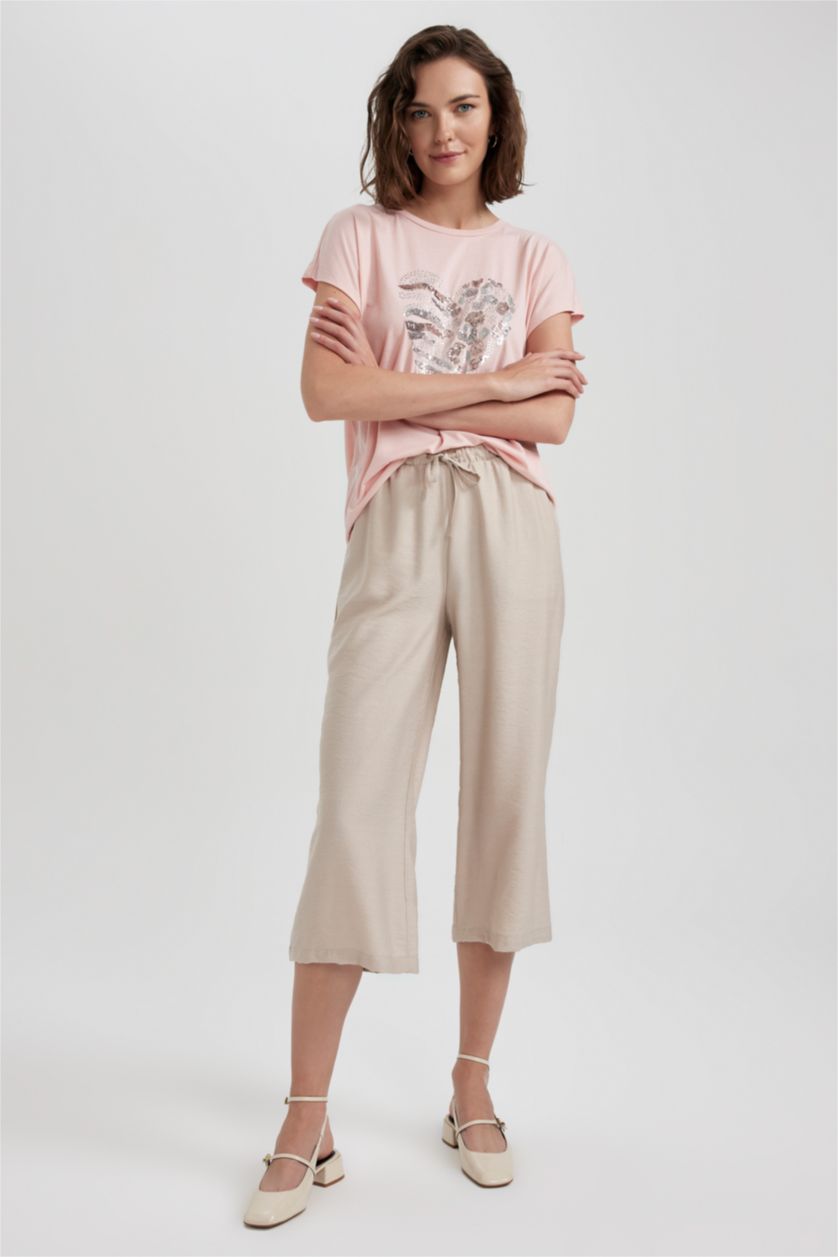 حريمي بيج بنطلون كابري كتان بجيب