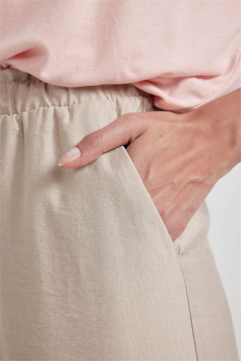 حريمي بيج بنطلون كابري كتان بجيب