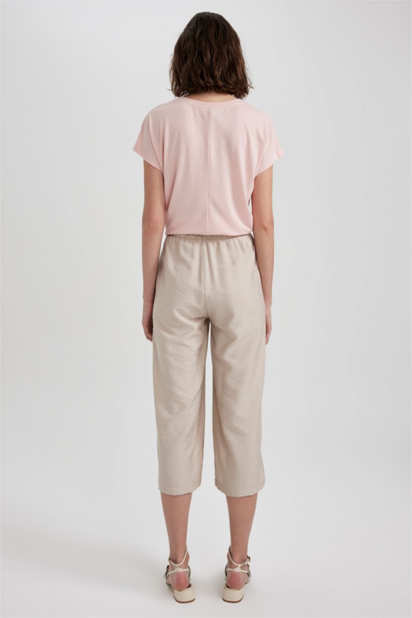 حريمي بيج بنطلون كابري كتان بجيب