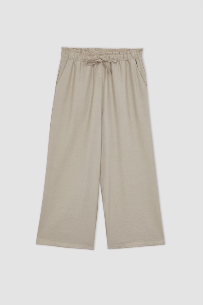 حريمي بيج بنطلون كابري كتان بجيب