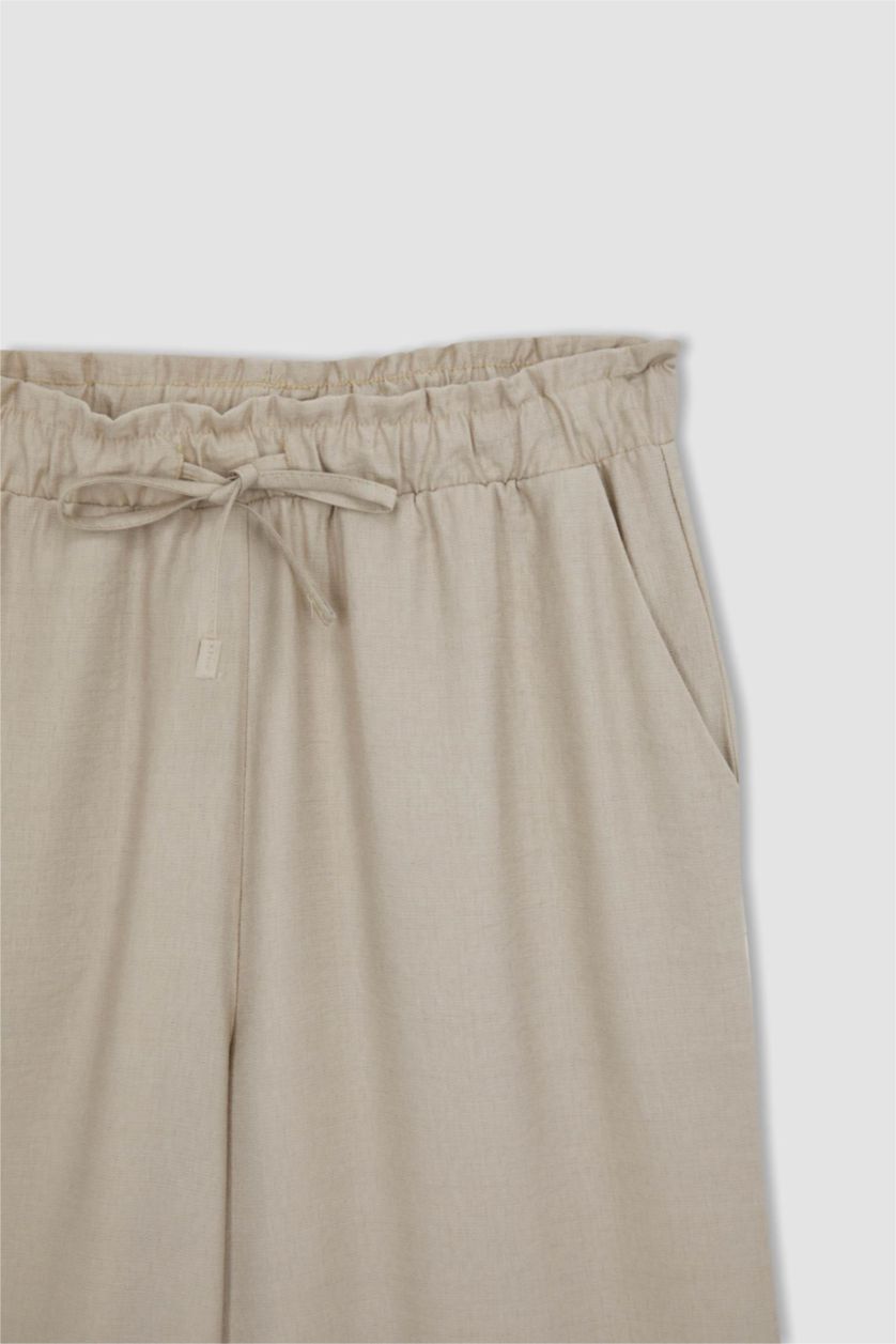 حريمي بيج بنطلون كابري كتان بجيب