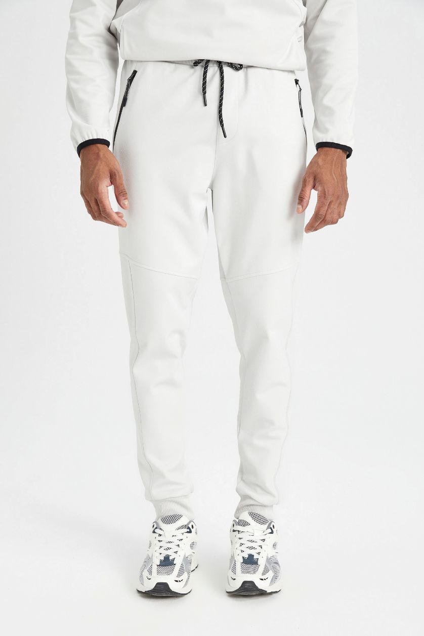 رجالي اللون الحجري بنطلون جوجر قماش سكوبا سليم فيت بأستك من تحت من DeFactoFit