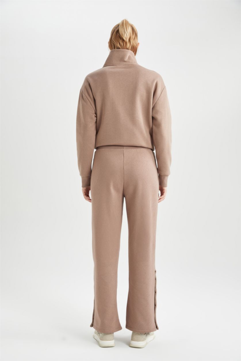 نساء بني فاتح بنطلون بجامة رياضي وايد ليج قماش سميك بجيب من DeFactoFit