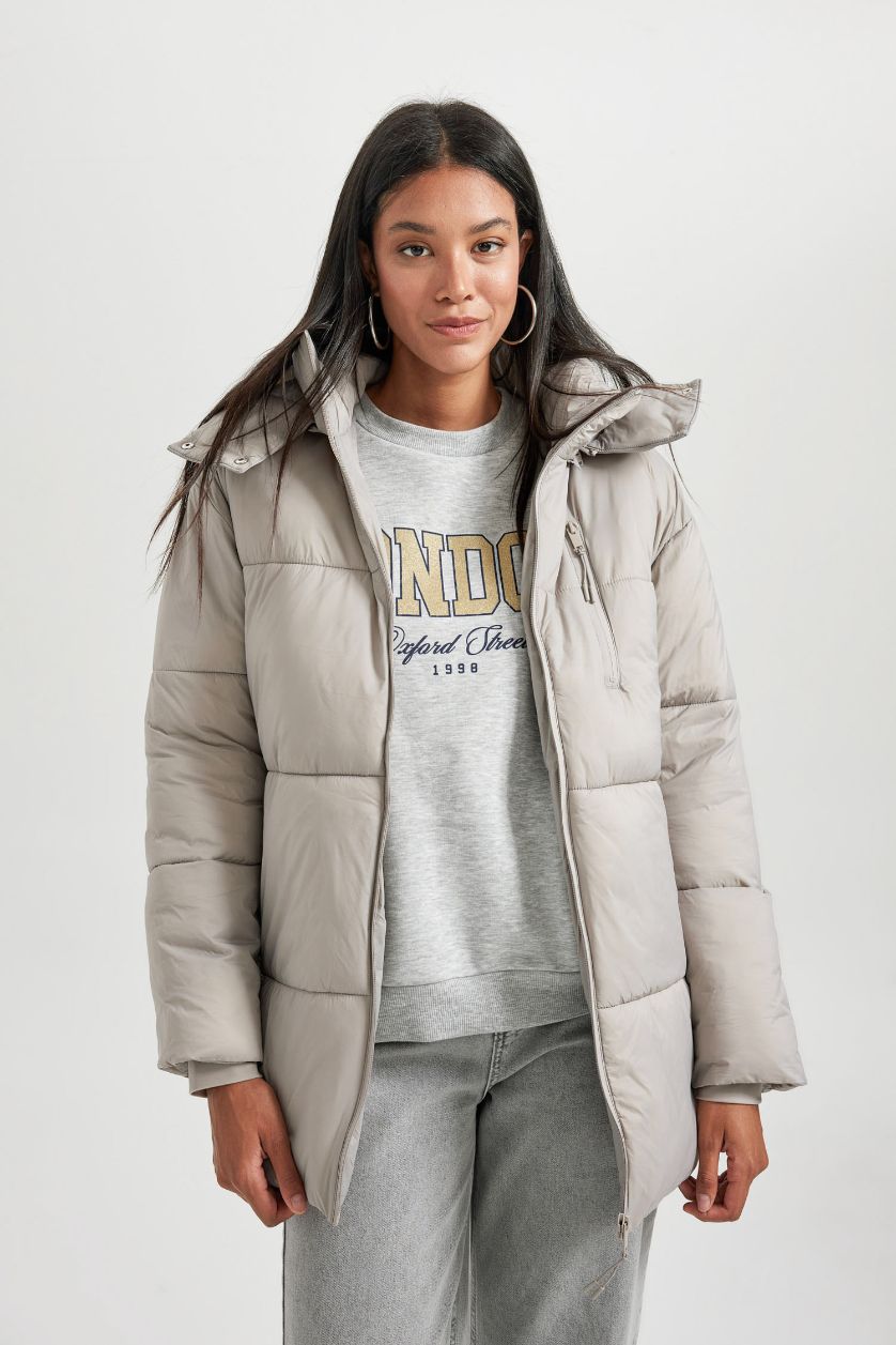 نساء بيج قمصلة نفخ قصة مريحة بغطاء للرأس مقاوم للماء