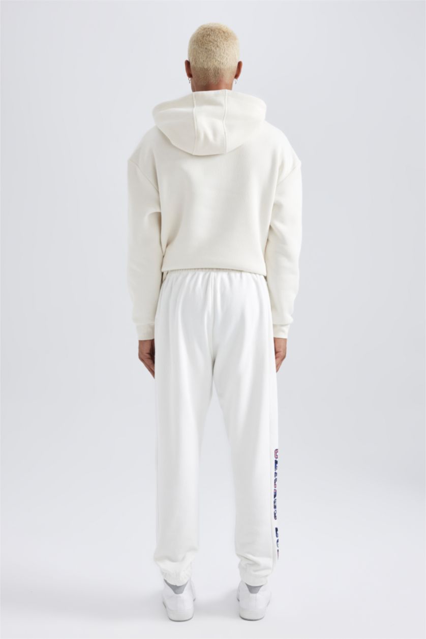 رجالي بيج فاتح بنطلون سويت بانتس جوجر قصة عادية