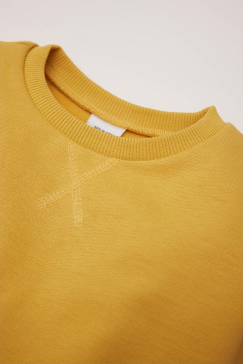 طفل صغير أصفر سويت شيرت بيزك تريكو اولادي قصة عادية ببطانة ناعمة