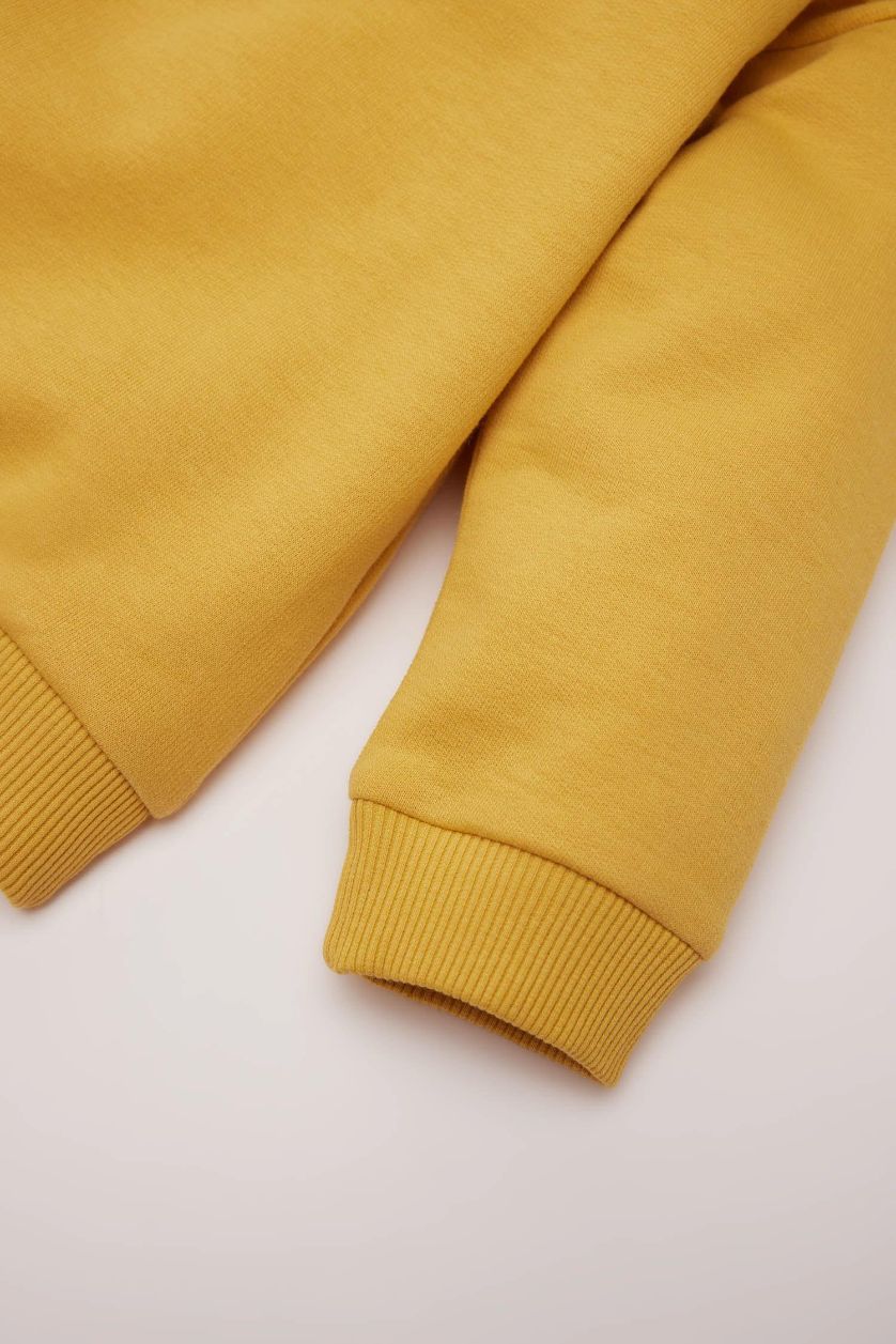 طفل صغير أصفر سويت شيرت بيزك تريكو اولادي قصة عادية ببطانة ناعمة