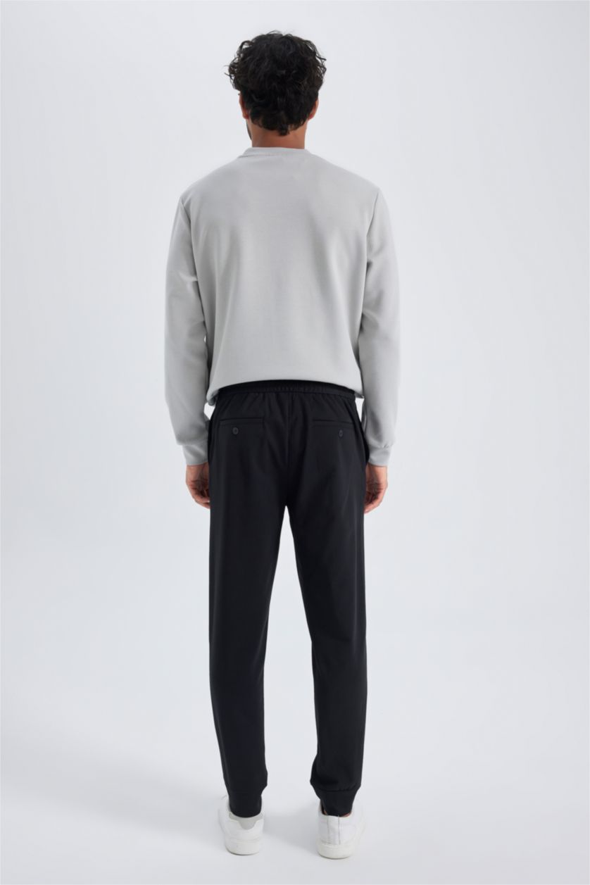 MAN Black Jogger All Way Stretch Trousers