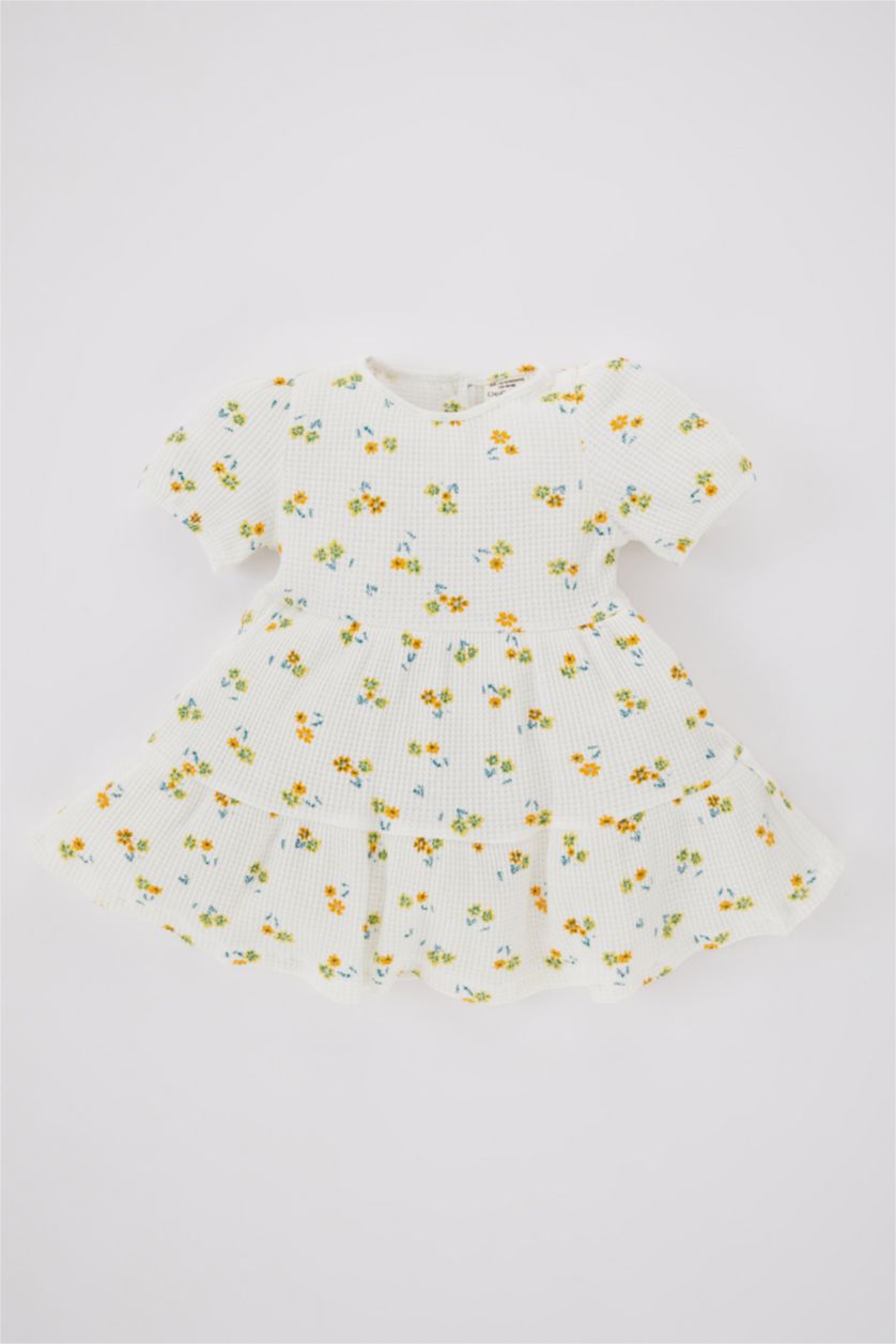 طفلة صغيرة بيج فاتح فستان بناتي فلورال بقصة عادية