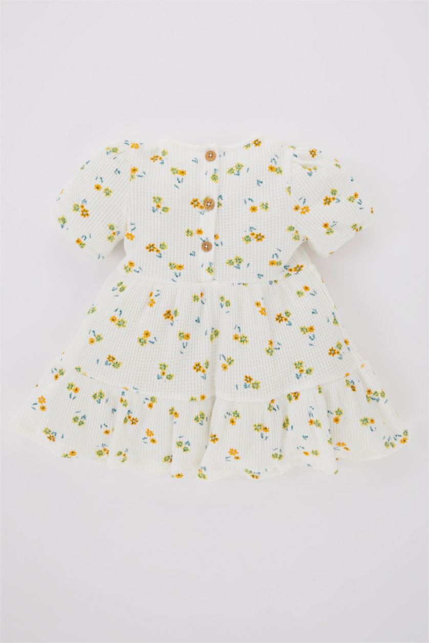 طفلة صغيرة بيج فاتح فستان بناتي فلورال بقصة عادية