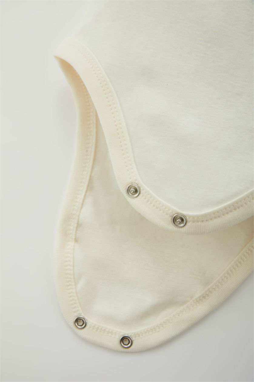 طفلة صغيرة بيج فاتح سالوبيت نص كم بيبي بناتي مضلع بياقة ظرف من قطعتين