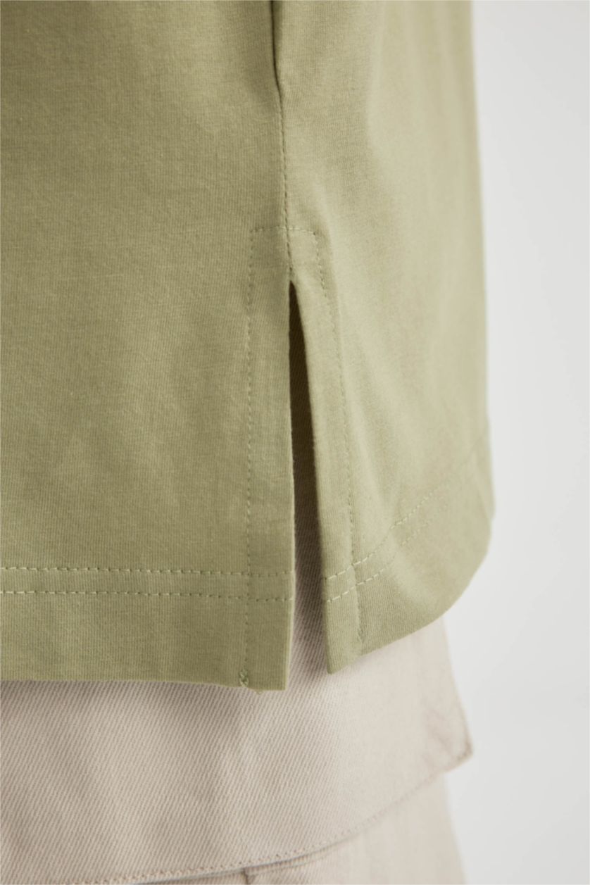 حريمي كاكي تونيك نص كم قطن قصة عادية بياقة مستديرة