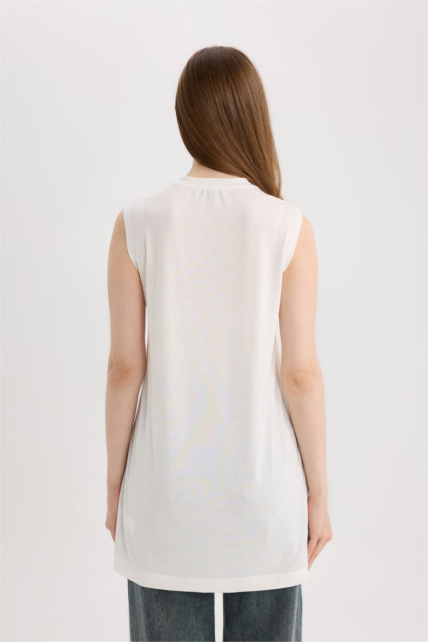 نساء بيج فاتح بلوزة كت بدون ردن قصة عادية بياخة مستديرة